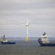Floating wind turbines and two boats